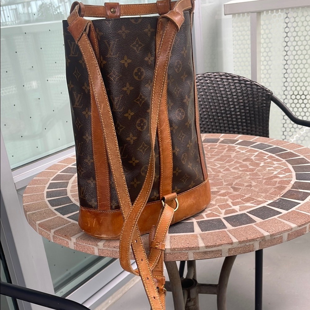 Louis Vuitton Brown Leather Backpack with Gold Hardware